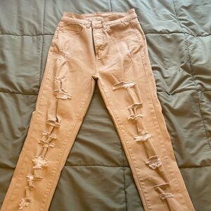 Distressed khaki pants